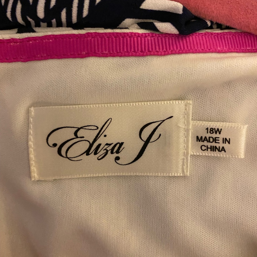 Eliza J navy and cream shift dress with bright pink detail.  3/4 length sleeves